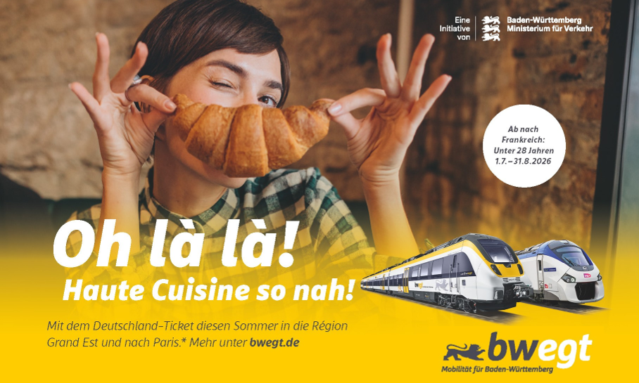 Junge Frau hält sich Croissant vor den Mund als Symbolbild für Frankreich